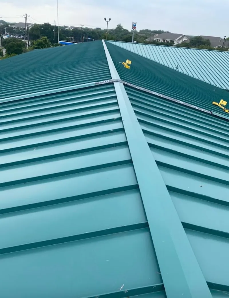 Green commercial metal roof ridge and valley for Metal Roof Repair in Lincoln